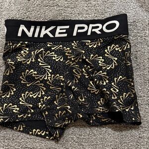Nike Pro Women's Athletic Shorts Black Gold Pattern